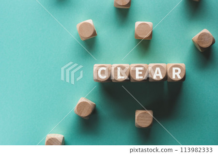 The wooden cube with the word CLEAR on it is an eye-catching image. 113982333
