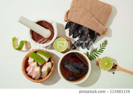 Preparation for producing cosmetic or shampoo with black locust is the main ingredient within lemon, grapefruit peel. Top view photo with blank space for designing Preparation for producing cosmetic or shampoo with black locust is the main ingredient within lemon, grapefruit peel. Top view photo with blank space for designing 113983159