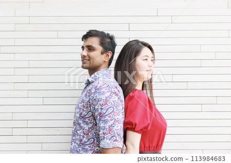 Back to back Japanese and Indian international couple Back to back Japanese and Indian international couple 113984683