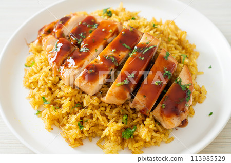 grilled sweet and chilli chicken with curry rice grilled sweet and chilli chicken with curry rice 113985529