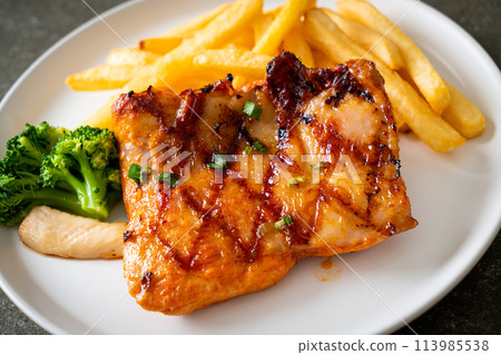 grilled chicken steak with potato chips or french fries 113985538