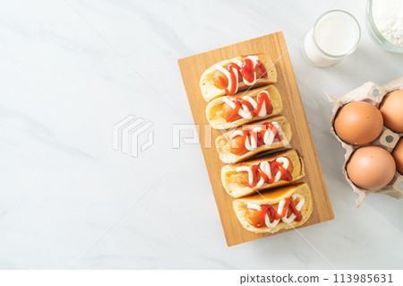 flat pancake roll with sausage flat pancake roll with sausage 113985631