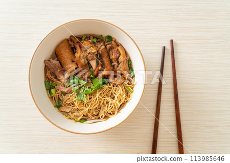Stewed pork leg noodles in brown soup 113985646