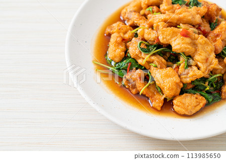 stir-fried fried fish with basil and chili in thai style stir-fried fried fish with basil and chili in thai style 113985650