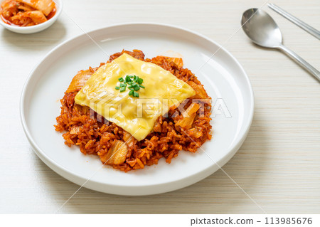 kimchi fried rice with pork and topped cheese 113985676