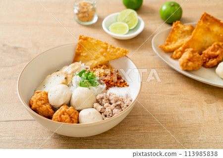spicy small flat rice noodles with fish balls and shrimp balls without soup 113985838