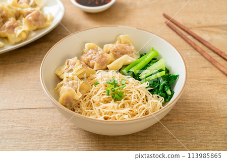 dried egg noodles with pork wonton or pork dumplings without soup dried egg noodles with pork wonton or pork dumplings without soup 113985865