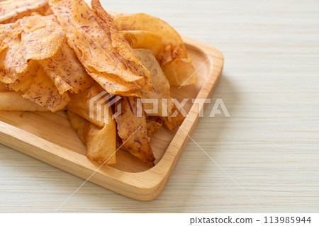 Taro Chips - fried or baked sliced taro Taro Chips - fried or baked sliced taro 113985944