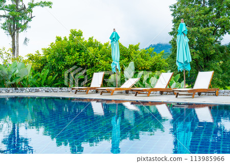 pool bed around swimming pool with mountain hill background 113985966