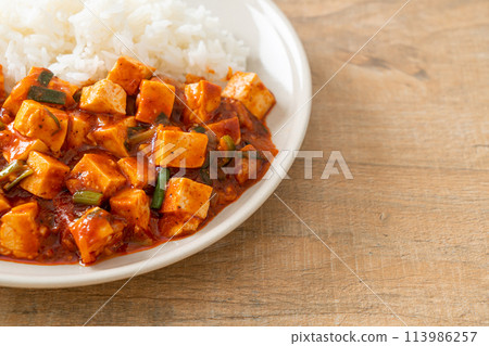 Mapo Tofu - The traditional Sichuan dish of silken tofu and ground beef, packed with mala flavor from chili oil and Sichuan peppercorns. Mapo Tofu - The traditional Sichuan dish of silken tofu and ground beef, packed with mala flavor from chili oil and Sichuan peppercorns. 113986257