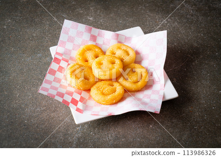 hash browns with ketchup and mayonnaise 113986326
