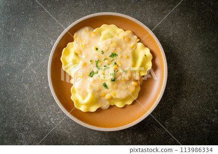 ravioli pasta with corn cheese sauce ravioli pasta with corn cheese sauce 113986334
