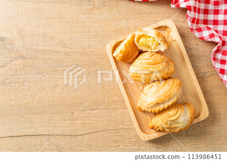 curry puff stuffed beans on plate curry puff stuffed beans on plate 113986451