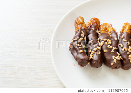 banana chocolate coating or banana dipped chocolate banana chocolate coating or banana dipped chocolate 113987035