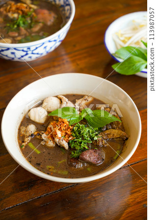 Thai boat noodles with pork 113987057