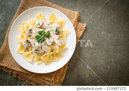 farfalle pasta with mushroom white cream sauce farfalle pasta with mushroom white cream sauce 113987172