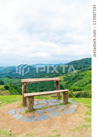 wood bar and chair with mountain hill background 113987193
