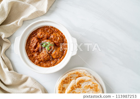 chicken tikka masala spicy curry meat food with roti or naan bread chicken tikka masala spicy curry meat food with roti or naan bread 113987253