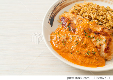 grilled chicken steak with red curry sauce and rice 113987305