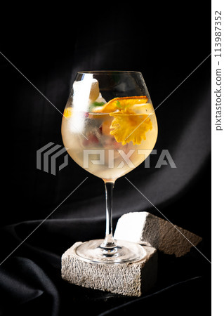 cocktail - white wine, tequila, triple,aromatic bitter, orange bitter, lime juice, syrup, topping with jelly and marshmello and mixed fruits cocktail - white wine, tequila, triple,aromatic bitter, orange bitter, lime juice, syrup, topping with jelly and marshmello and mixed fruits 113987352