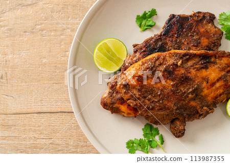 spicy grilled jamaican jerk chicken 113987355
