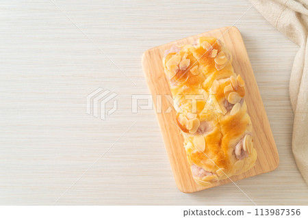 taro toast bread on wood board 113987356