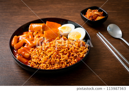 Korean instant noodles with Korean rice cake and fish cake and boiled egg Korean instant noodles with Korean rice cake and fish cake and boiled egg 113987363