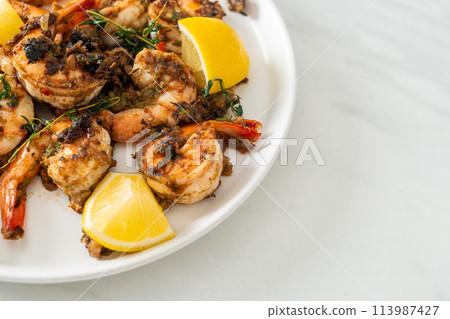 jerk shrimps or grilled shrimps in Jamaica style jerk shrimps or grilled shrimps in Jamaica style 113987427