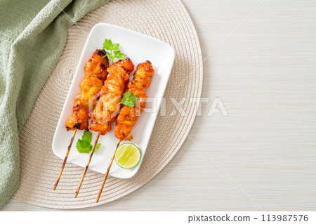 grilled chicken skewer with herbs and spices grilled chicken skewer with herbs and spices 113987576