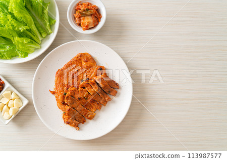 grilled pork marinated Kochujang sauce in Korean style with vegetable and kimchi 113987577