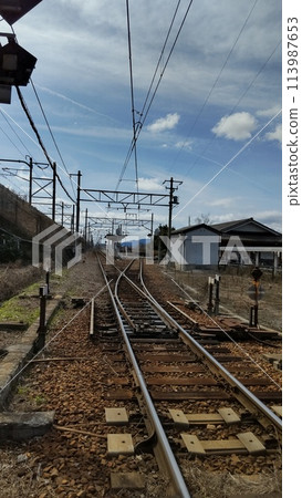 The tracks continue on forever at Omi Railway Amago Station The tracks continue on forever at Omi Railway Amago Station 113987653