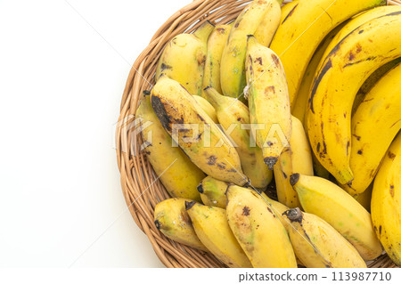 fresh yellow bananas in basket 113987710