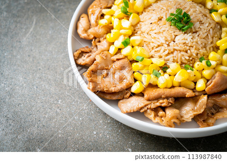 fried rice with pork sliced and corn 113987840