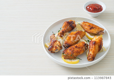 fried lemon pepper chicken wings fried lemon pepper chicken wings 113987843