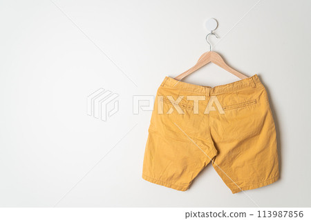 short pants hanging on wall short pants hanging on wall 113987856
