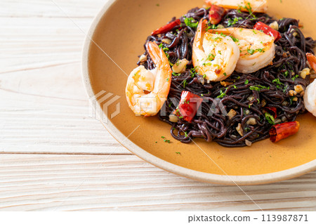 stir-fried black spaghetti with garlic and shrimps stir-fried black spaghetti with garlic and shrimps 113987871