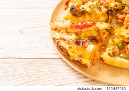 seafood pizza on wood tray 113987983