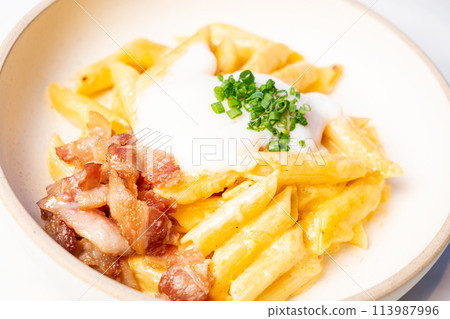 penne pasta carbonara bacon with egg 113987996