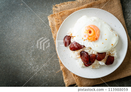 rice with fried egg and Chinese sausage 113988059