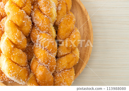 sugar doughnut in spiral shape 113988080