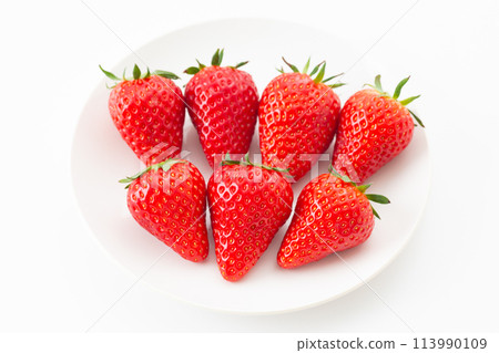 Large strawberries on a white background Large strawberries on a white background 113990109