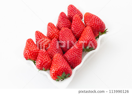 Large strawberries in a pack on a white background Large strawberries in a pack on a white background 113990126