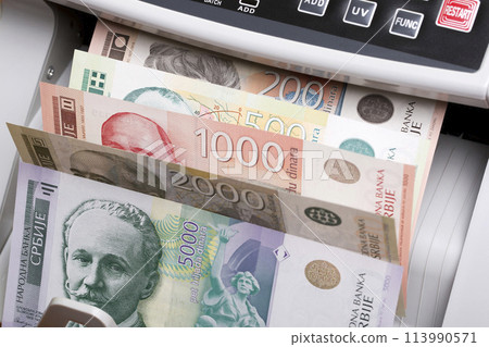 Serbian dinar in a counting machine 113990571
