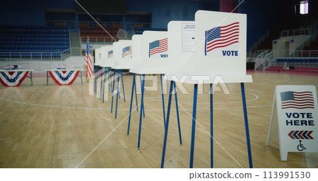 Voting booths with American flag logo at polling station Voting booths with American flag logo at polling station 113991530