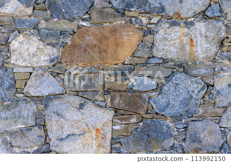 Texture of old stone brick wall in city 113992150