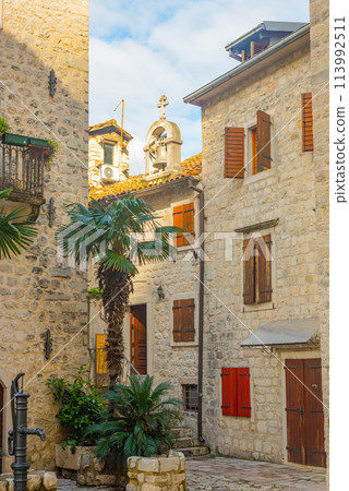 Beautiful narrow streets of old town Kotor, Montenegro. Beautiful narrow streets of old town Kotor, Montenegro. 113992511