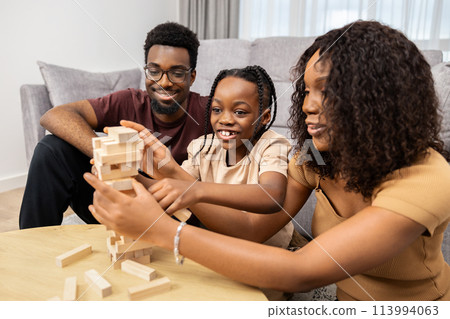 Happy Family Playing Game Together In Living Room 113994063