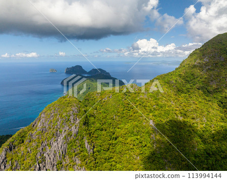 Limestone rock formation over the mountain in Cadlao Island. El Nido, Palawan. Philippines. 113994144