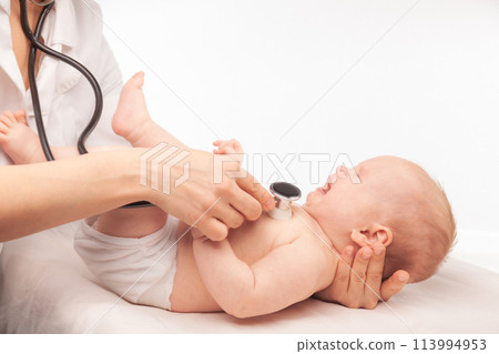 Pediatric Check-up Doctor Examining a Crying Baby with Stethoscope 113994953