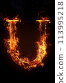 Fire letter U made of burning letters on black background 113995218
